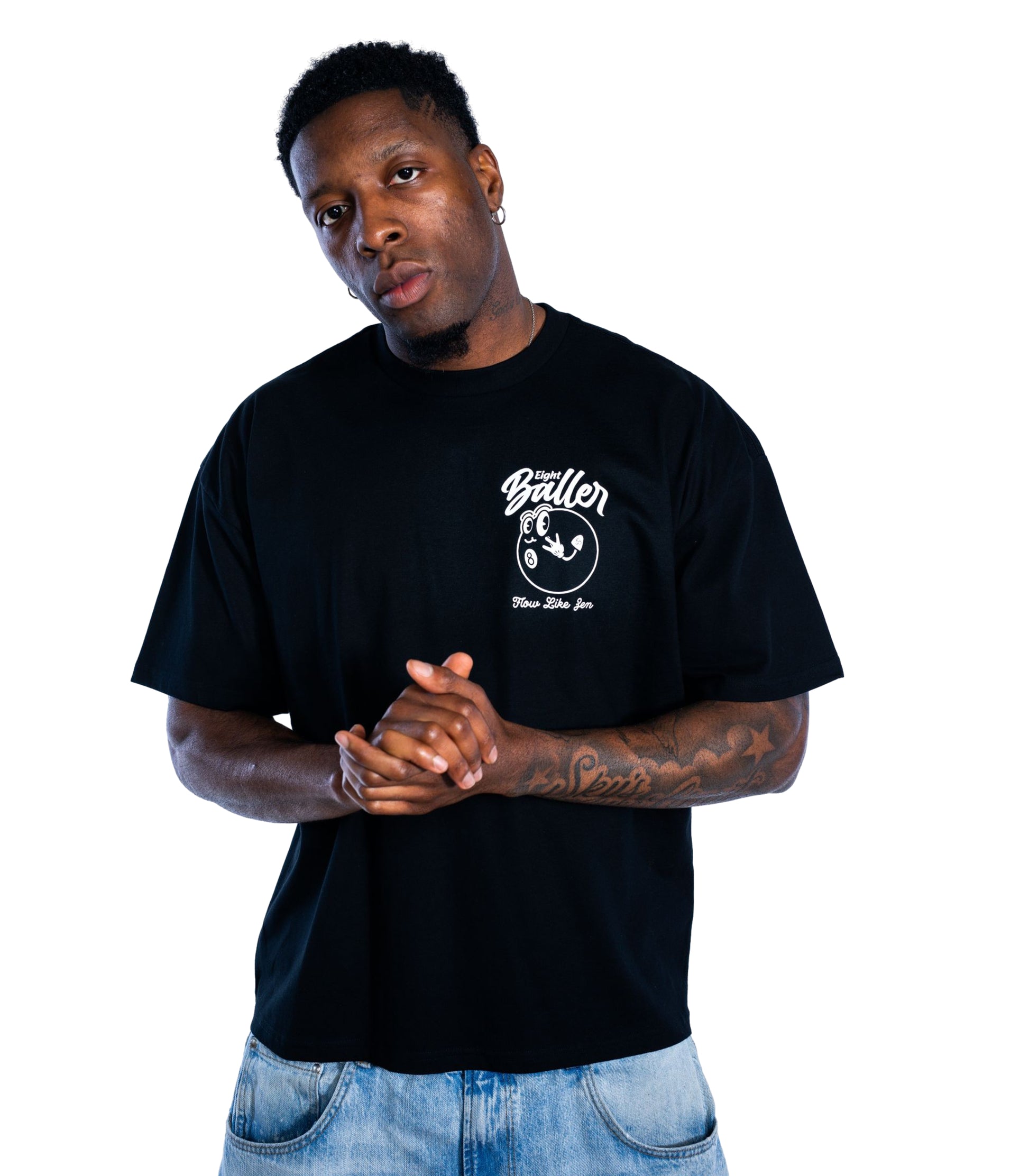 Oversized black graphic t-shirt with small front cartoon 8-ball print – Eight Baller UK streetwear brand for men, casual and stylish urban clothing.