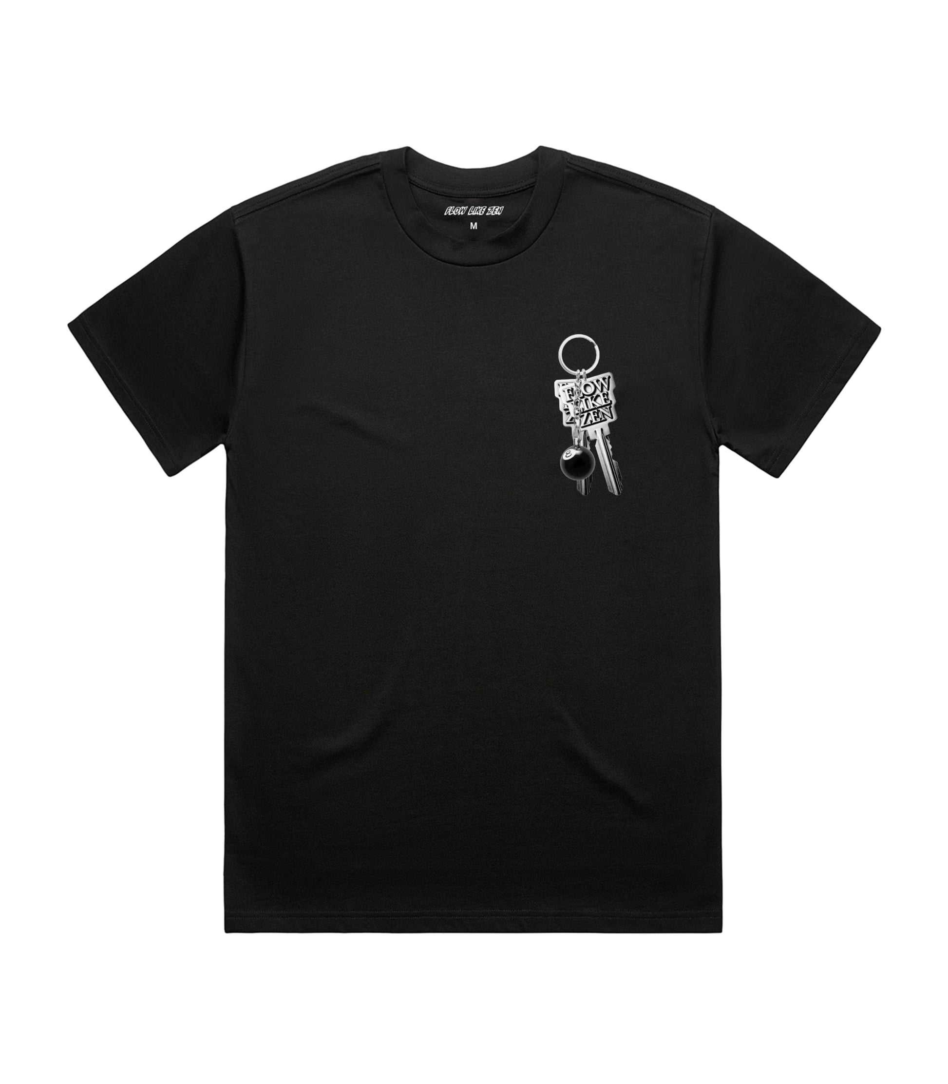 Flat lay of black Flow Like Zen t-shirt featuring large silver keychain back print with engraved logo and 8-ball pendant – premium UK streetwear design.