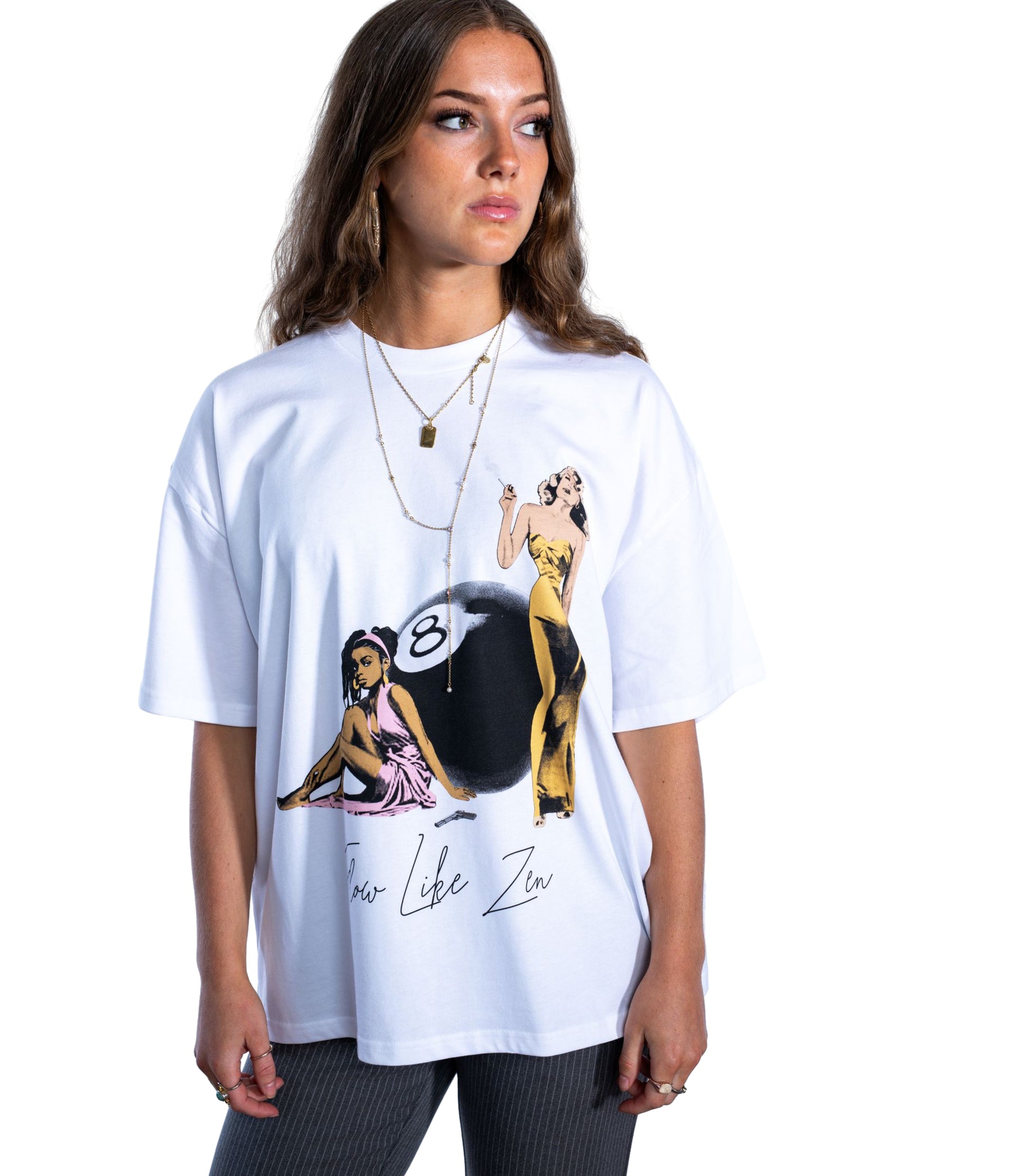 Female model wearing Flow Like Zen white t-shirt with 8 ball and vintage femme graphic – luxury British streetwear.
