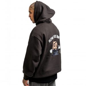 Male model wearing a black hoodie with a graphic design of a dice on the back of the hoodie.